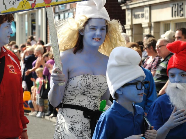 Smurfs on their way to the fancy dress.