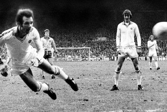 Paul Reaney heads on goal for Leeds United with Allan Clarke in the background. (Varley Picture Agency)