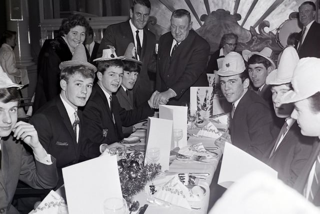 Leeds United manager Don Revie with the club's junior players at their Christmas party. (Varley Picture Agency)