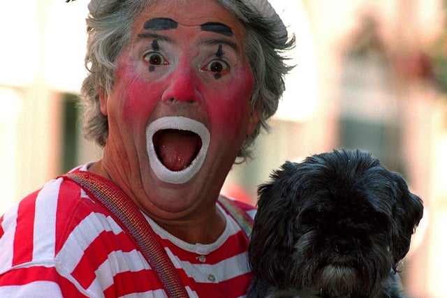 Clown Dr Palfi with his dog Soushong in August 1997.