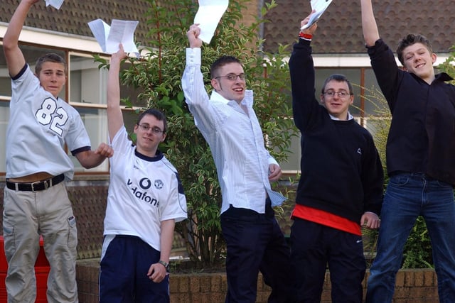 Holy Cross High School pupils, from left, Ryan Yeaomans, Robert English, Ben Dickinson, Matthew English and George Kenyon celebrate their GCSE results