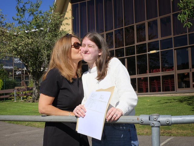 Auntie Emma Wilson congratulates Becky Garrington at Graham School.