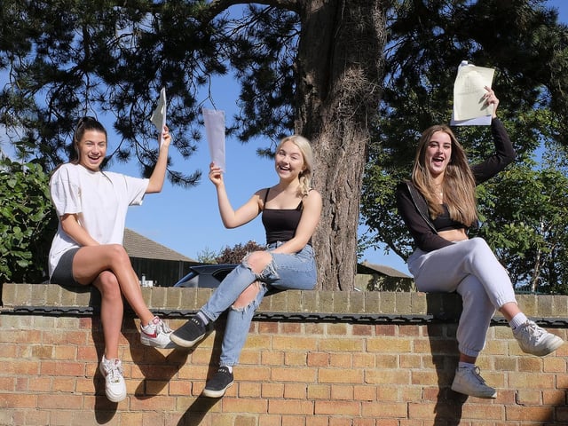 Jessica Nalton, Olivia Lester and Matilda Tomlinson celebrate at Scalby.