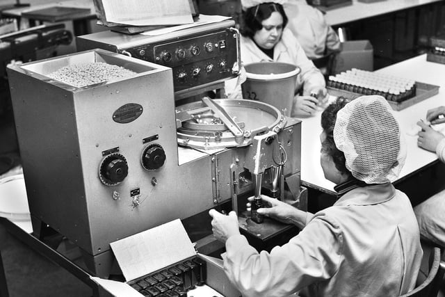 Pills and tablets counted electronically as they are put into bottles at Potter's Herbs factory in Leyland Mill Lane in March 1977.