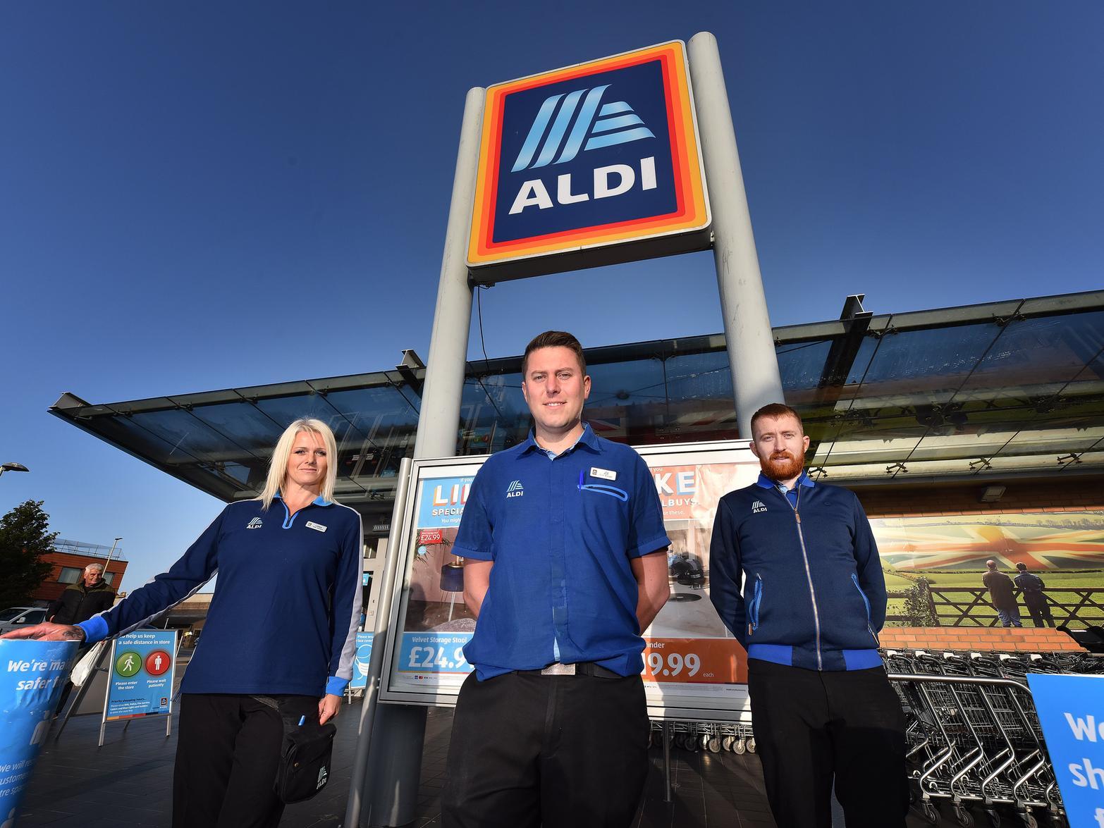 Staff Lorna McCloud, Manager Joe Sorenson and Joe Gage ready to greet customers.