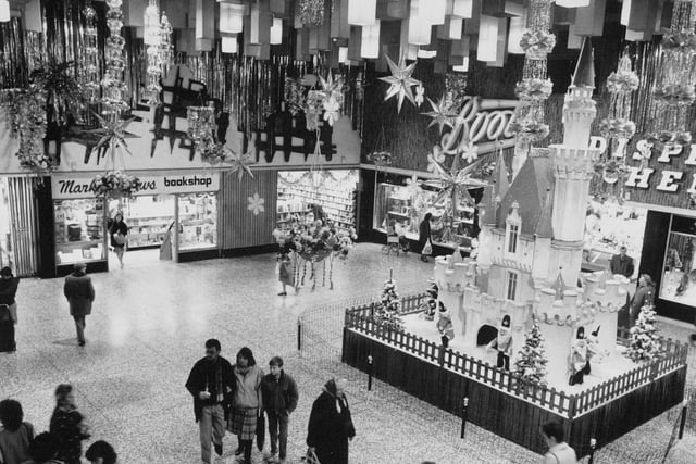 Inside the Arndale Centre which is trimmed up for Christmas in December 1988.
