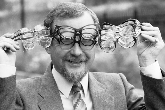 Making a spec-ticul  spec-tacle of himself!  Roving reporter Geoffrey Shryhane promoting the recycling of old spectacles to fund charitable causes in 1986.