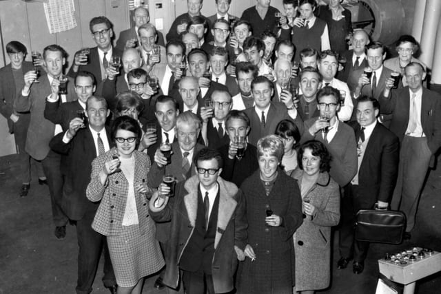 The early years - Geoffrey Shryhane heads the group, front centre, with colleagues at the Wigan Observer offices and printing premises in Woods Street, Wigan, 1966.