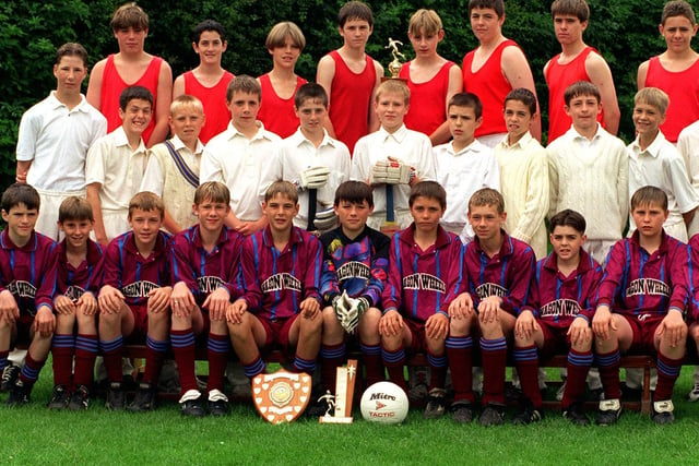 Champion teams in July 1997 at athletics (back row), cricket (middle row) and football (front row)