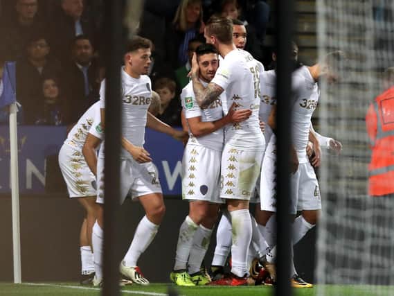 Leeds United's players celebrate Pablo Hernandez's opening goal against Leicester City. (Getty)