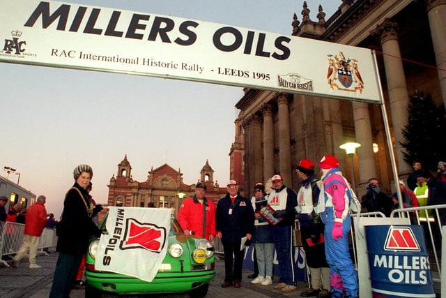 The Lord Mayor of Leeds Peggy White waves off the first car to start Millers Classic Car Rally from Leeds Town Hall.