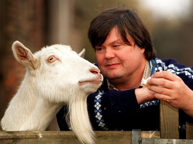Thwaite Mill took in a Saanen goat named Lucy. The goat's life was in danger from fox attacks on moorland near Tormorden. Pictured with Lucy is Thwaite Mill curator Derek Davies.