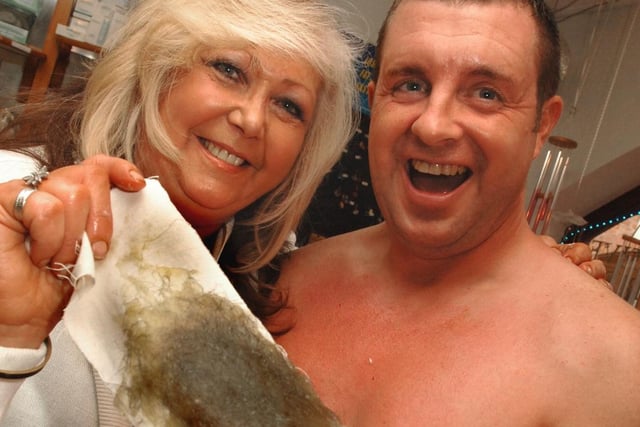 Paul Collier from Wigan Groundwork had his chest waxed to raise money for Children in Need, pictured with Marie Lawrence at Serenity Health and Beauty in Jaxon's Court, Wigan.