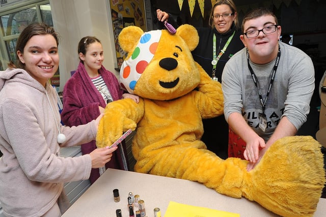 Pudsey Bear gets massage, his nails done and a 'fur do' thanks to Hawkley Brook College students and Ella Healey, from Asda Wigan distribution centre at Marus Bridge, during the pamper morning for Children In Need 2012.