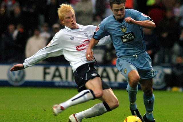 Danny Pugh is tackled by Preston North End striker Andy Smith.