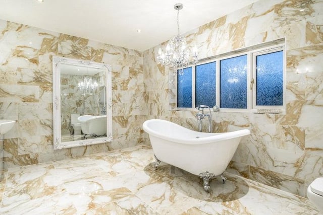 A stunning bathroom to relax in the bath.