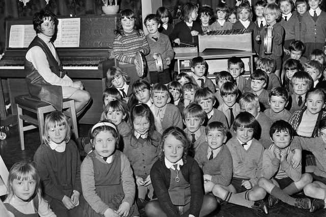 Infants gather for a music lesson at All Saints Primary School, Appley Bridge.