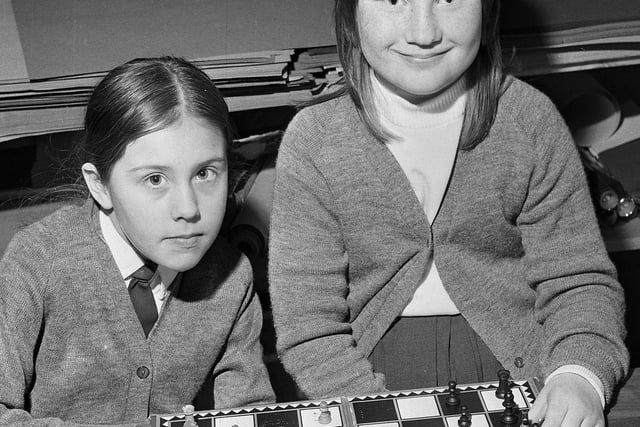 Chess enthusiasts Lesley Croucher, left, and Cathy Cheetham, both aged ten, at All Saints Primary School, Appley Bridge.