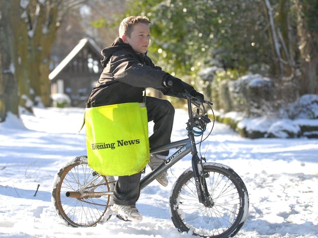 A news paper boy in Scalby makes sure the paper gets to customers despite weather back in 2010.