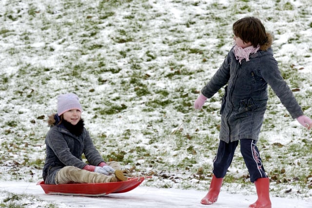 Twin sisters Sarah and Holly, enjoyed sledging near the old railway line path at Woodlands back in 2005.