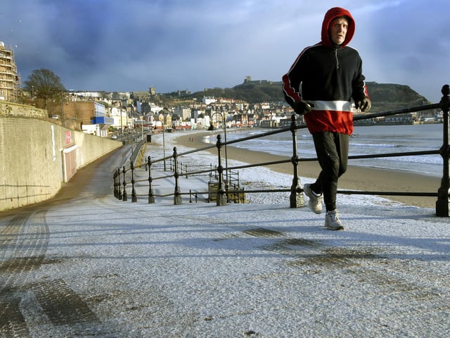 A lone jogger out early on the snow dusted seafront back in 2007.