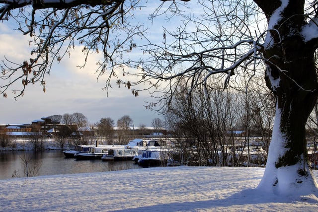 Snow covered boats at Ripon Marina over looking the Racecourse back in 2009.