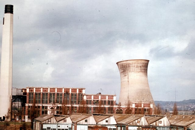 April 1979. Kirkstall Power Station during the demolition of the cooling tower. The sheds of the John Collier clothing factory can be seen in the foreground.