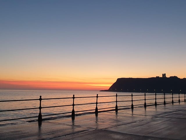 Sarah Smith enjoys the the castle and headland view.