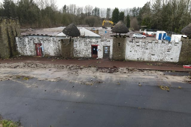 The front wall of the theme park has been left standing to prevent people - including urban explorers - from entering the site whilst work is under way. But the iconic white castle-themed entrance has been demolished. Pic: Martin Pratt