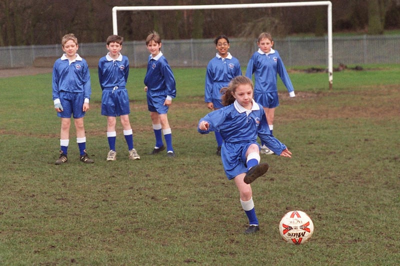 Emma Friend was a female member of the football team at Wigton Moor Primary. She is pictured practising her shooting skills by Murray Wilson, Jonathan Anderson, Liam Tarbett, Harwek Soor and Ben McCarron.