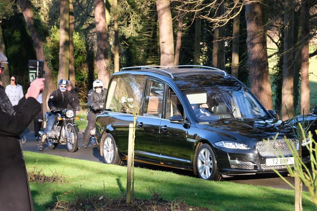 The hearse was followed by Barry's beloved BMW motorbikes.