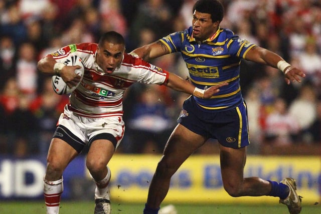 LEEDS, UNITED KINGDOM - MARCH 13:  Ryan Bailey of Leeds tackles Thomas Leuluai of Wigan during the engage Super League match between Leeds Rhinos and Wigan Warriors at Headingley Stadium on March 13, 2009 in Leeds, England.