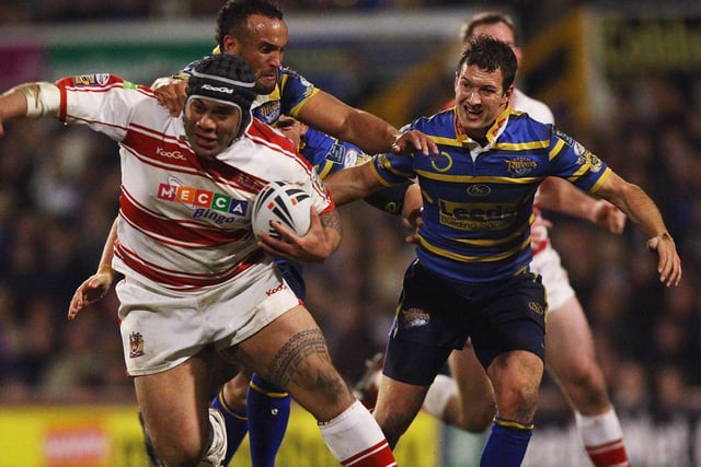 LEEDS, UNITED KINGDOM -13 MARCH 2009:  Jamie Jones-Buchanan of Leeds tackles Iafeta Palea'aesina of Wigan during the engage Super League match between Leeds Rhinos and Wigan Warriors at Headingley Stadium on March 13, 2009 in Leeds, England.  (Photo by Matthew Lewis/Getty Images)