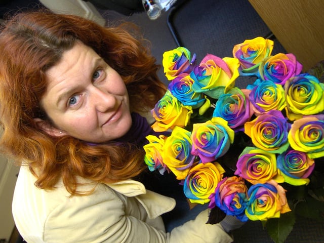 Jo White from Floristry Commission sells some unusual rainbow roses.