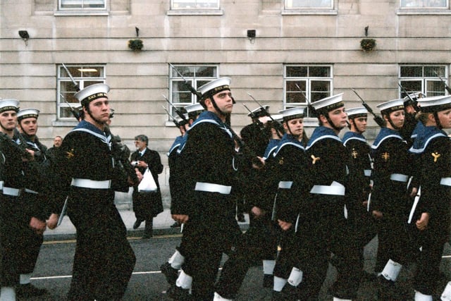 Members of the Ark Royal Guard as they perform a March Past. The March Past was taken by The Lord Mayor and Captain Nance OBE. The Ark Royal Guard wear white belts and gaiters and carry rifle mounted bayonets.