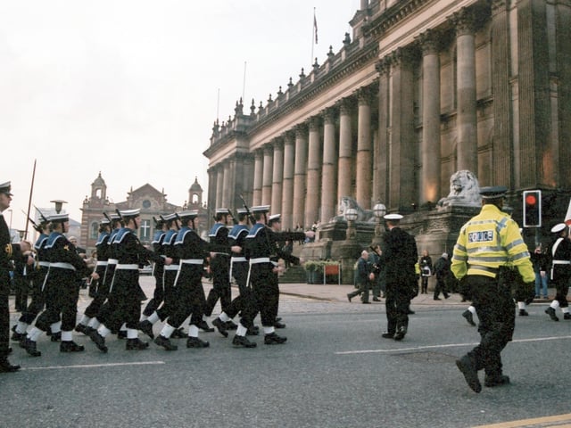 Members of the Ark Royal Guard marching past the Town Hall as they turn onto Calverley Street.