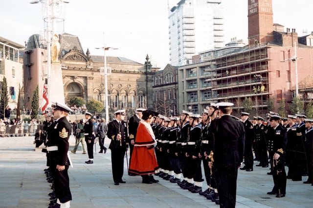 The Lord Mayor of Leeds carries out an inspection of the Ark Royal Guard. He is accompanied by Captain Adrian Nance OBE and a Lieutenant.
