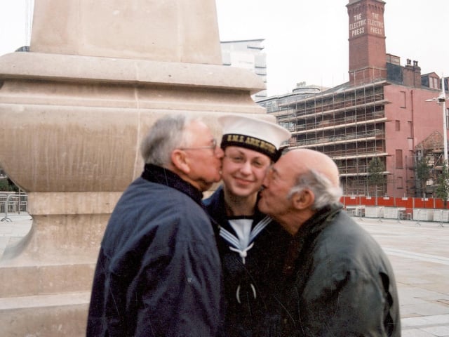 Pct Zoe Beer of the company of the Ark Royal is kissed on the cheek by two Navy veterans. Pictured is Derek Vickers (left) with Derrick Nunn.