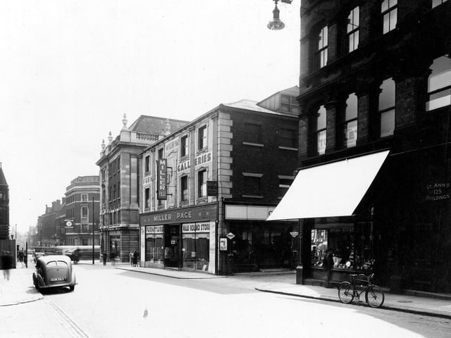 Albion Street, looking south to Boar Lane across The Headrow, in August 1939. St Ann's Buildings housed Hillman Brothers wireless factors, Leeds Premier Supply Co. clothing club, Miss Lizzie Crosby artist, Loyal Order of Ancient Sheperds Friendly Society.