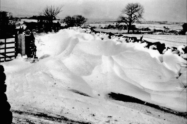 And this photograph shows a heavy fall of snow blocking the lane to Bell Hurst Farm, Roeburndale East, in Wray, nearLancaster, during that winter in 1963