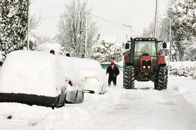 And this tractor makes light work of the snow, motoring past snow covered in Burscough in 2010