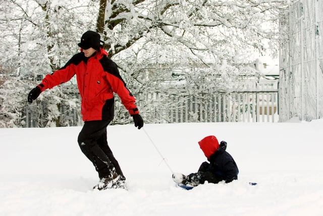 Lots of you remember the cold weather and snow in 2010. Here's Rev Ian Greenwood with his son Andrew, seven, enjoying a sled ride in Burscough