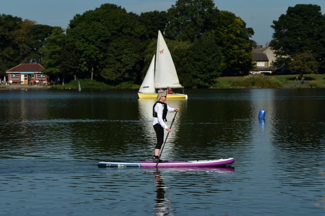 A paddle boarder enjoys the warm weather at Yeadon Tarn during the summer. Picture: Jonathan Gawthorpe.