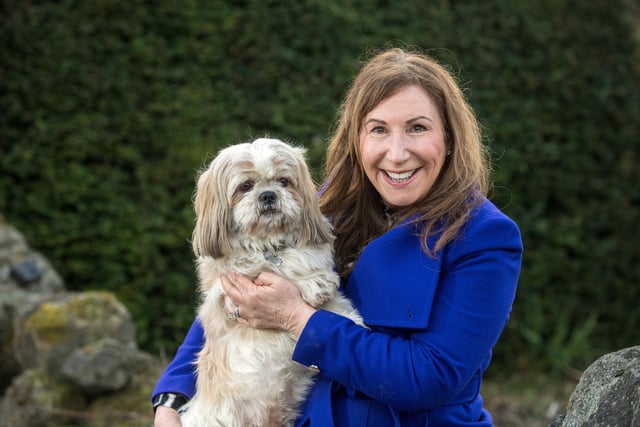 Television writer Kay Mellor and her dog, Happy, as they prepared for the broadcast of series four of The Syndicate in February. Picture: Bruce Rollinson.
