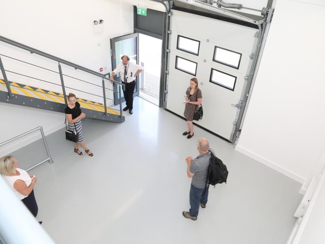 The workshop spaces include a mezzanine floor