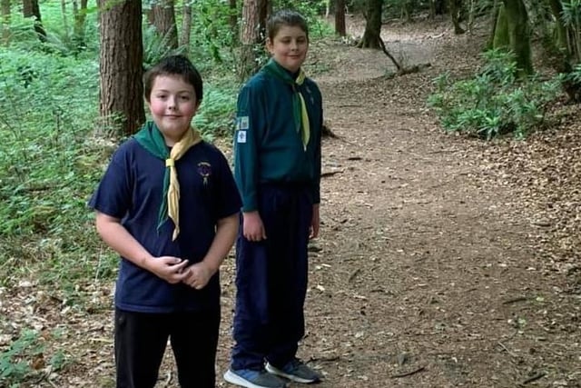 Members of the 1st Roffey Scout Group taking part in the centenary walk SUS-200630-114621001