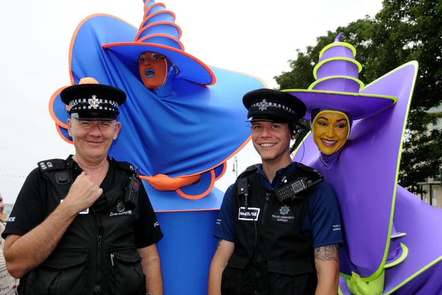 St Leonards Festival 2010: PC Mick Bishop and PCSO Steve Isted with two Helter Skelter dancers. Picture: Tony Coombes BH30302h