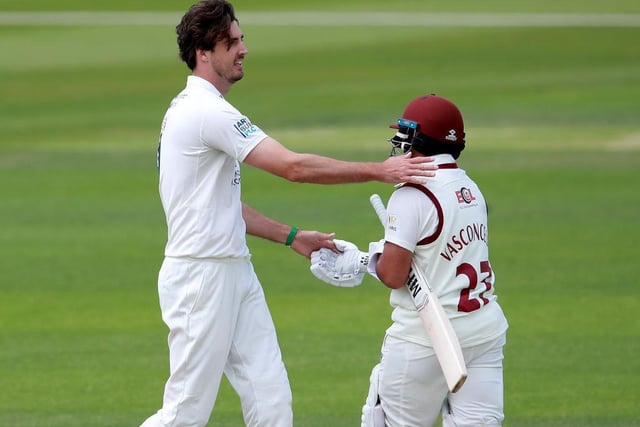 Steven Finn consoles Ricardo Vasconcelos after dismissing the Northants man first time around