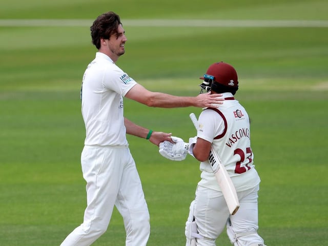 Steven Finn consoles Ricardo Vasconcelos after dismissing the Northants man first time around
