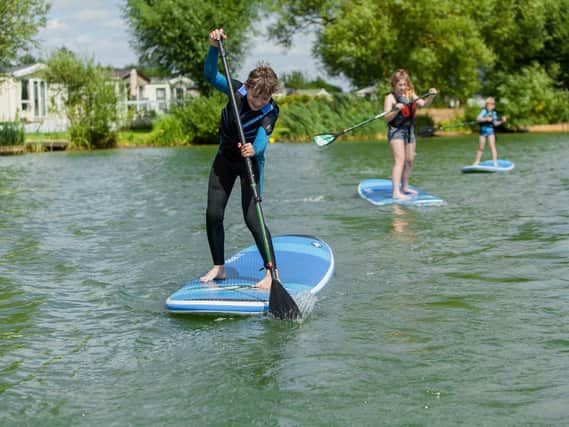 Kids will never be bored at Cosgrove Park with so many free watersports, including catamaran sailing and stand-up paddleboarding